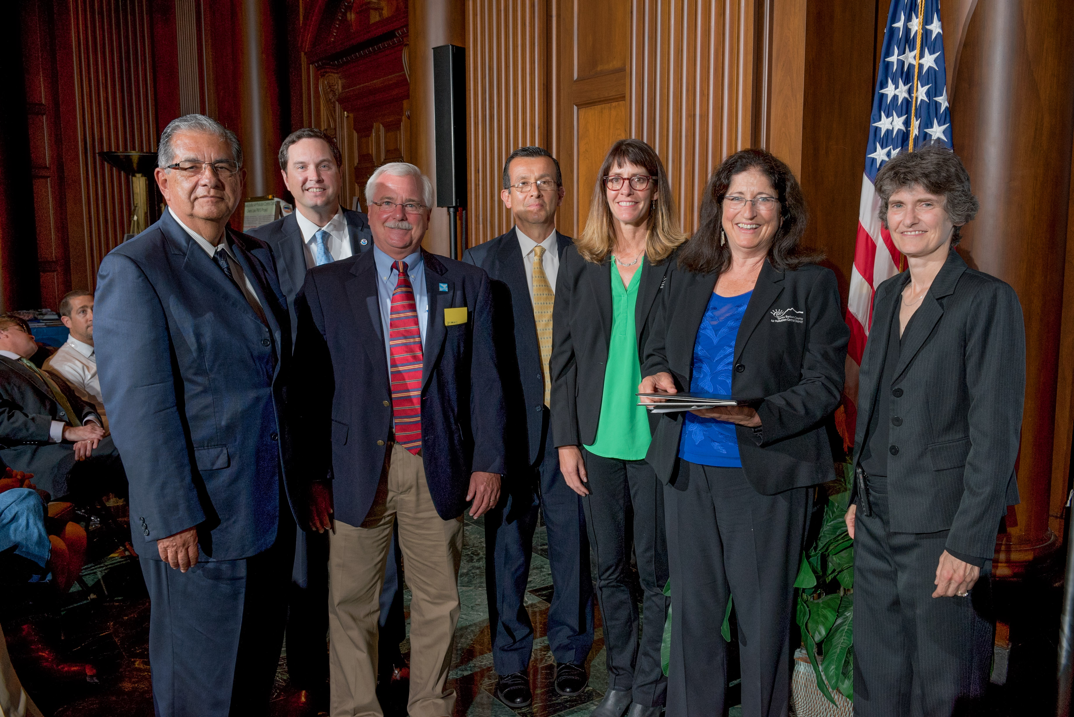 Award Recipients (from left) receiving the Clean Air Excellence Award: Ventura County Supervisor John Zaragoza, Chair of the Board of Ventura County Air Pollution Control District (VCAPCD); John Armor, Acting Director of the Office of National Marine Sanctuaries (representing Channel Islands National Marine Sanctuary); Ted Lillestolen the Interim President and CEO for the National Marine Sanctuary Foundation; Mike Villegas, Air Pollution Control Officer, VCAPCD; Aeron Arlin Genet, Air Pollution Control Officer, Santa Barbara County Air Pollution Control District (SBCAPCD); Mary Byrd, Community Programs Supervisor, SBCAPCD; Janet McCabe, Acting Assistant Administrator, U.S. Environmental Protection Agency Office of Air and Radiation. Not pictured: Award recipient Environmental Defense Center